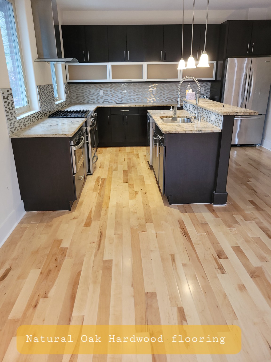 Kitchen with natural oak hardwood flooring