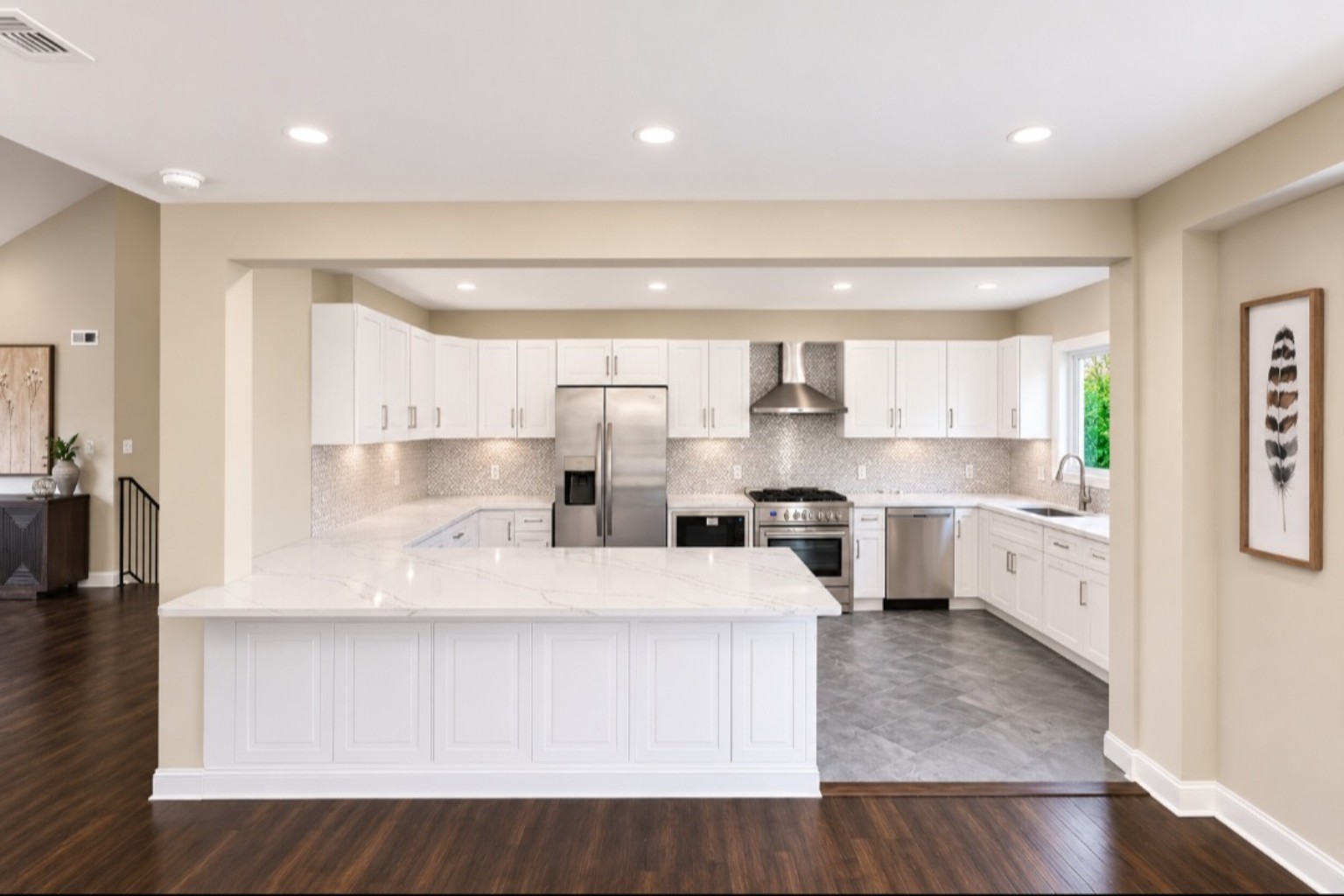 Finished white kitchen remodel viewed from the dining area